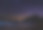 银河和许多星星在瓦迪拉姆沙漠的山上。夜晚的天空与夏季的美景，概念的空间背景和旅行。图片下载
