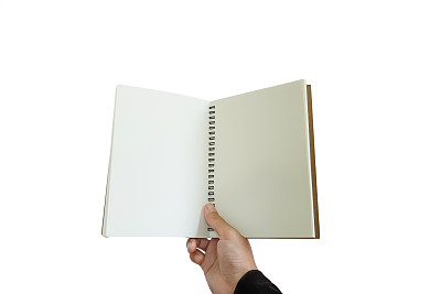 手拿着打开的笔记本，孤立在白色的背景上图片下载