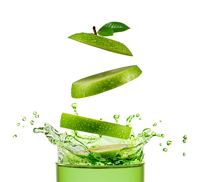 绿苹果和果汁飞溅图片下载