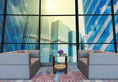 酒店大堂区域，可以看到抽象的城市景观建筑背景，商业金融概念的模糊照片图片下载