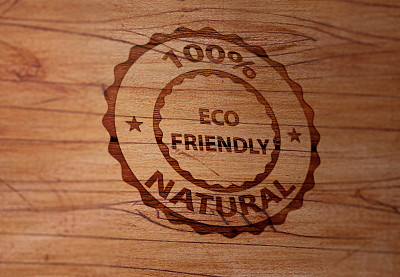 木制表面上的环保邮票图片下载