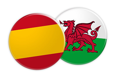 新闻概念:西班牙国旗按钮在威尔士国旗按钮，3d插图在白色的背景图片下载