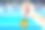 少数亚洲男子拿着金牌与模糊的背景游泳池和游泳比赛。图片下载