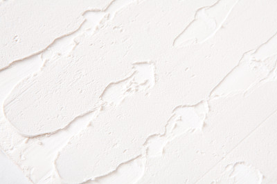 白色墙壁与石膏图案的背景素材图片