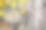 木桌上放着一瓶从葵花籽中提取的油，上面是平放的素材图片
