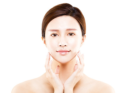 年轻女人美丽面部肖像，白色背景素材图片