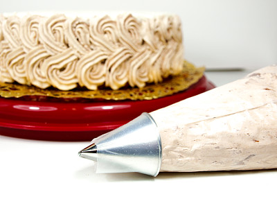 奶油袋与糖果图案工具的特写图片下载