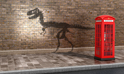 这个概念。电话亭在现在的无关紧要。电视亭子里投下了恐龙骨架的影子。3 d演示。图片下载