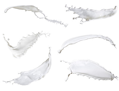 白色牛奶，混合飞溅孤立在白色背景图片下载