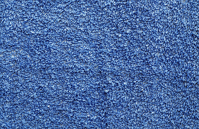 蓝色毛巾图案特写。素材图片