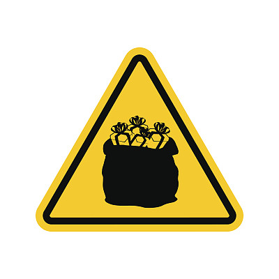 警告标志注意圣诞礼物。圣诞老人的口袋是三角形的。黄色的危险信号。注意新年礼物和问候图片下载