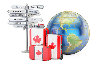 加拿大旅游的概念。带加拿大国旗，路标和地球仪的手提箱图片下载