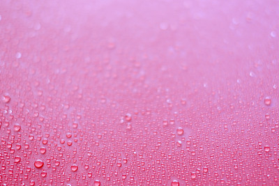抽象的粉红色背景与水滴图片下载
