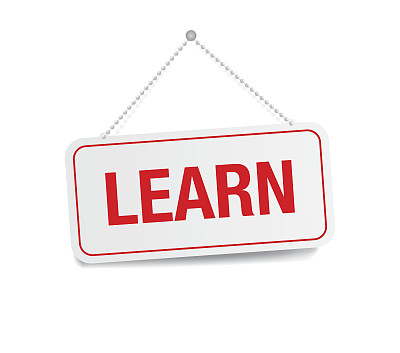 学会在白色墙壁上单独悬挂标志图片下载