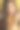 金色的化妆。优雅的黑发女人。时尚珠宝。波浪发型。哑光的嘴唇。性感的女士模特在金色的裙子与金色的配件在散景灯光派对的背景。图片下载