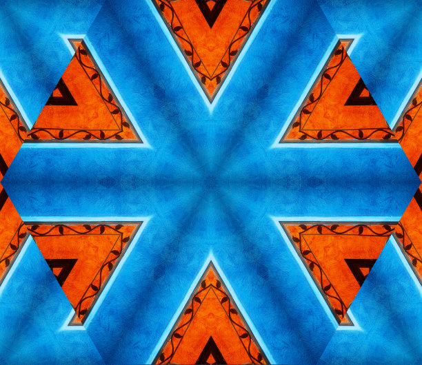 抽象背景与几何万花筒设计与主要的蓝色和橙色颜色图片下载