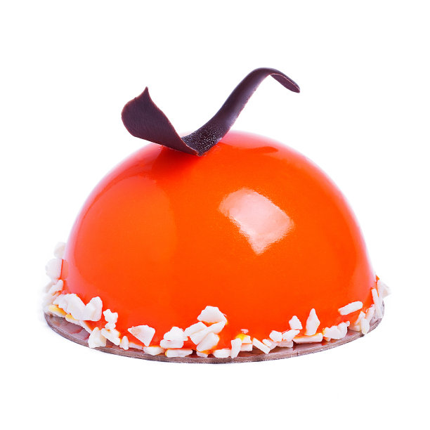 法式慕斯蛋糕，表面覆有橙色釉，表面白。杏与巧克力装饰的现代欧洲甜品图片下载