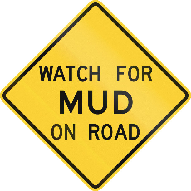 在美国德克萨斯州使用的路标-注意道路上的泥图片下载