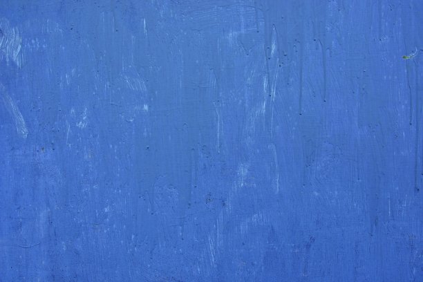 纹理的复古锈迹灰铁墙背景与多层油漆和锈迹图片下载