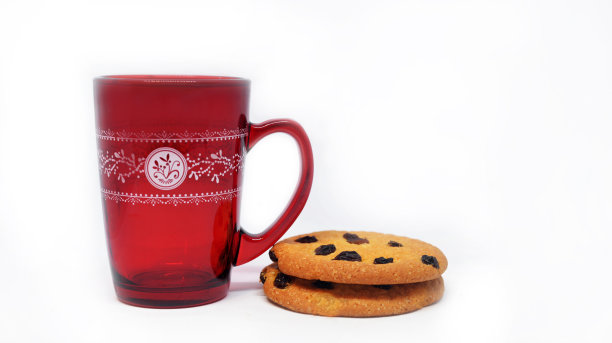 红色的杯子和饼干图片下载