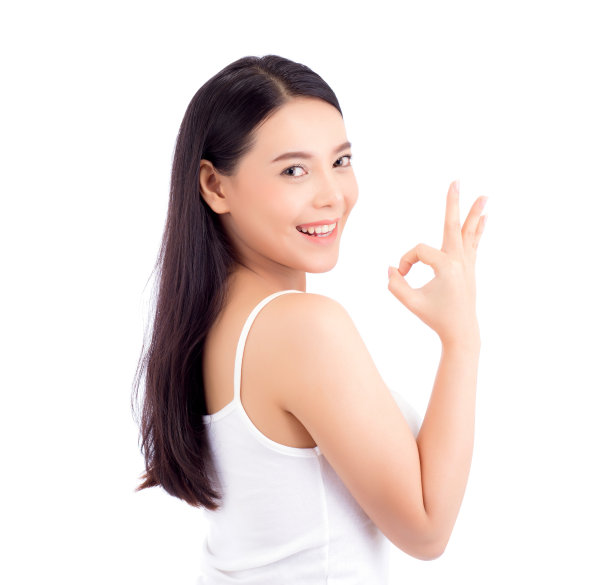 美丽的亚洲女人肖像化妆化妆女孩的手势可以在迷人的脸上与皮肤保健概念孤立在白色的背景。图片下载