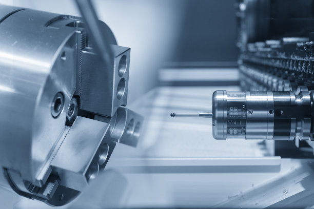 数控车床和三坐标测量探头的抽象场景。图片下载