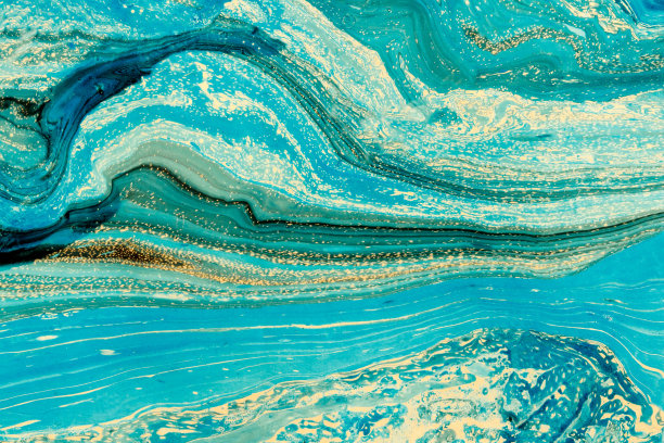 有抽象大理石绘画的现代艺术品。混合蓝色和黄色油漆。不寻常的手工背景海报，卡片，邀请。丙烯酸涂料在水面上。水平的。素材图片