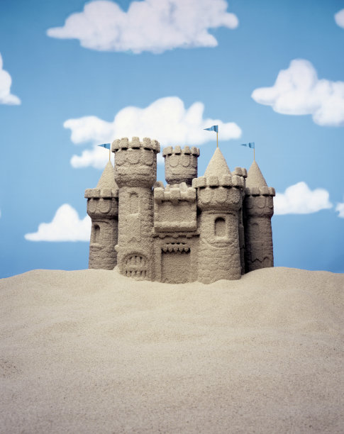 沙城堡对抗彩云背景图片下载