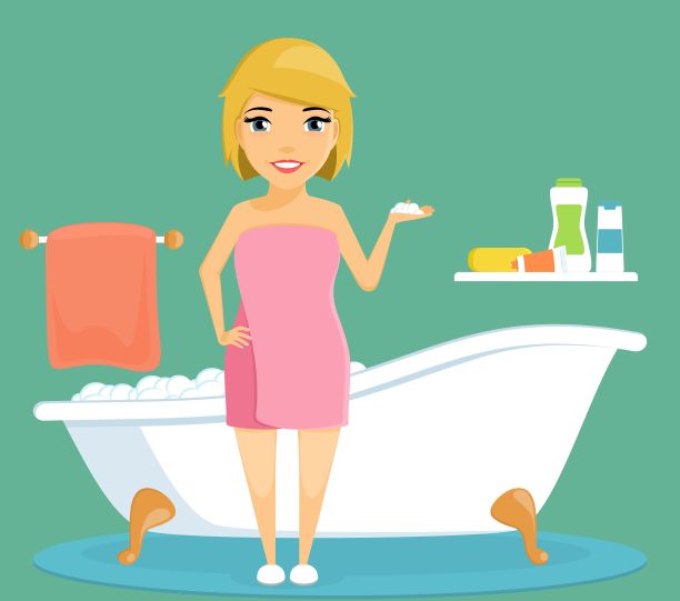 一个年轻的女孩在浴室里。图片下载