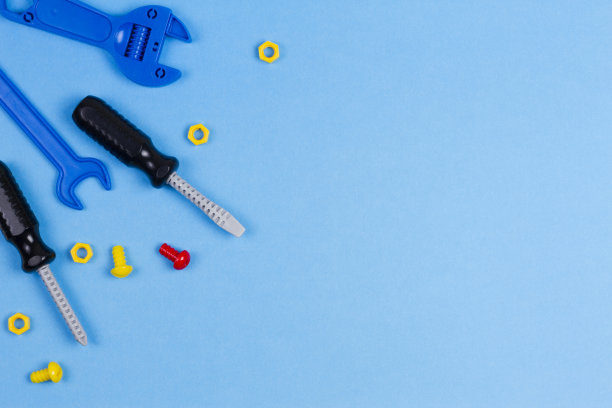 玩具的背景。玩具工具在蓝色背景。俯视图图片下载