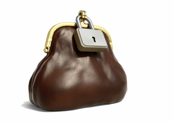 皮革钱包硬币与锁图片下载