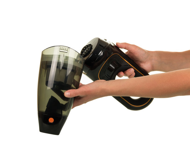 女性双手打开汽车吸尘器隔离上白图片下载