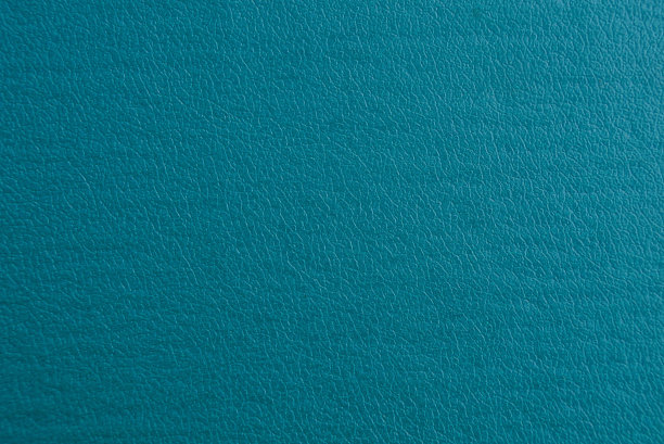 蓝色背景的旧皮革书封面图片下载