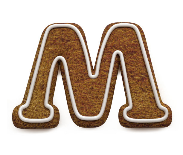 姜饼字体。圣诞饼干字母概念。大字母M图片下载