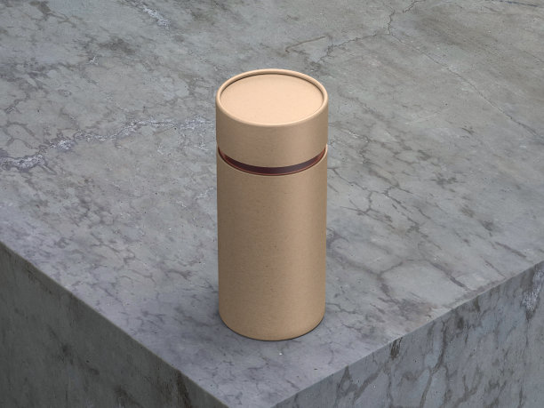 牛皮纸管，纸板罐模型在混凝土桌上图片下载