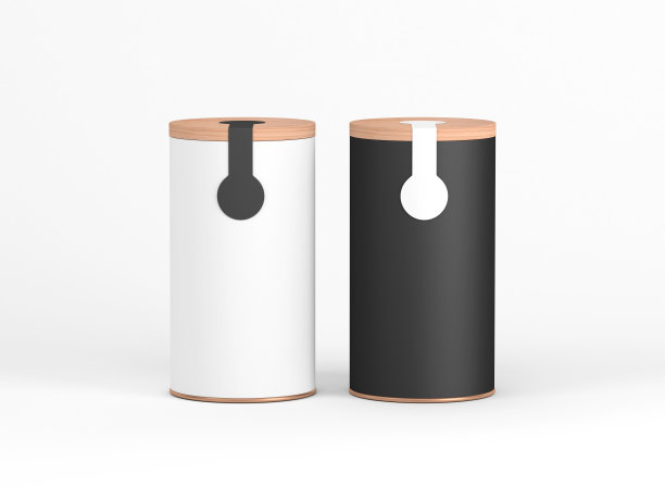 两罐罐头模型与木盖和贴纸，标签。黑白圆柱包装，茶，咖啡素材图片