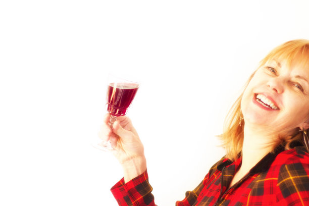 女人享受一杯红酒，特写图片下载