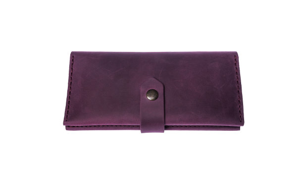 白色背景上的女性钱包。图片下载