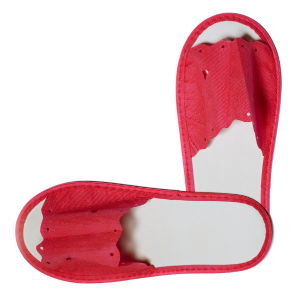 粉色背景的红色一次性拖鞋图片下载