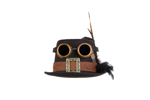 蒸汽朋克的帽子和护目镜前面的白色背景素材图片