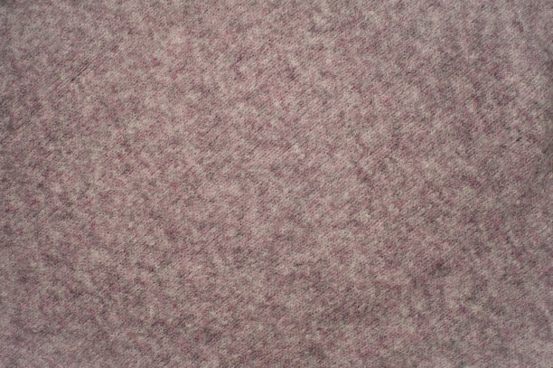 粉红色织毛针织毛衣的质地。织物背景图片下载