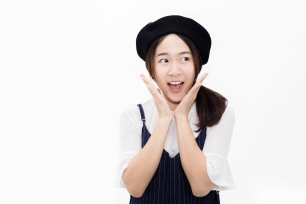 惊讶的年轻漂亮亚洲女性（白色背景）素材图片