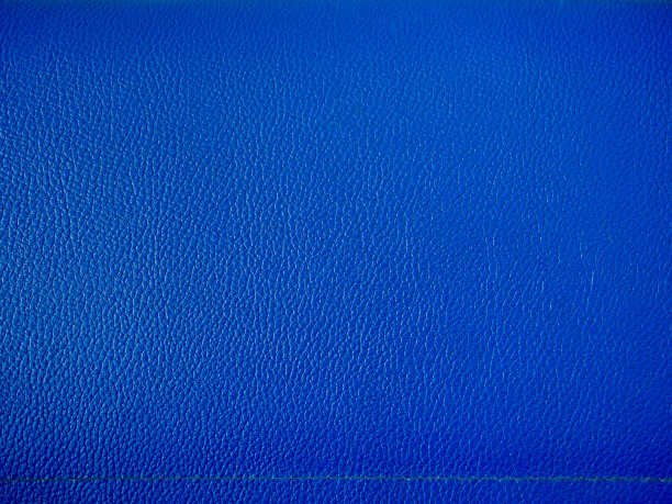 蓝色皮革质地。宏观背景。聚氨酯皮革图片下载