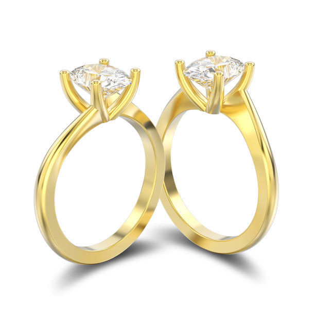 3D插图孤立的两个黄色黄金订婚错觉扭曲戒指与钻石与阴影图片下载