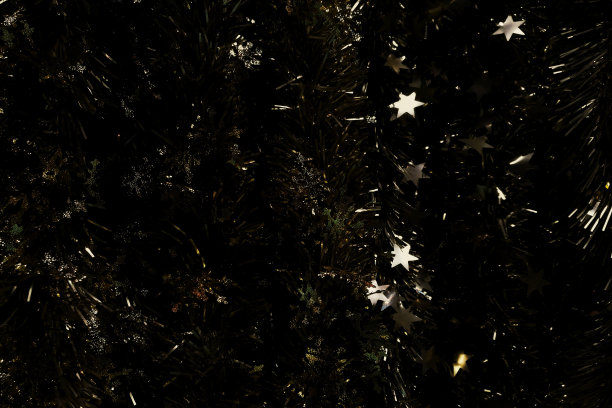 金色的星星闪烁着金色的背景图片下载