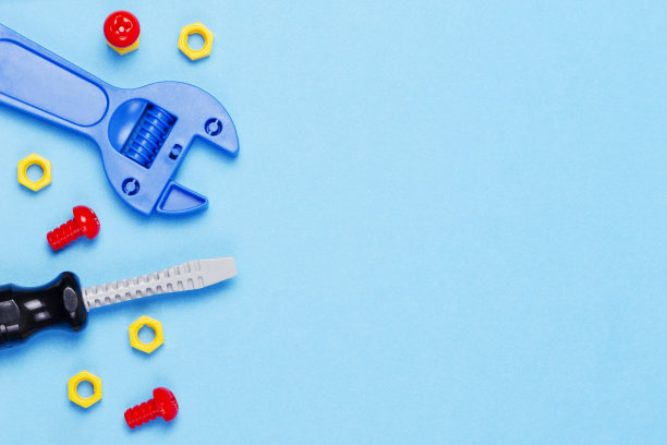 玩具的背景。玩具工具在蓝色背景。俯视图图片下载
