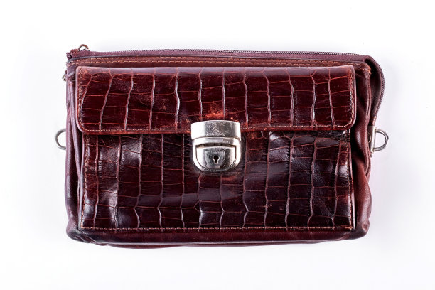 男人的旧棕色皮包。图片下载