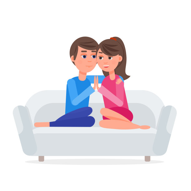 一对年轻夫妇在沙发边拥抱图片下载