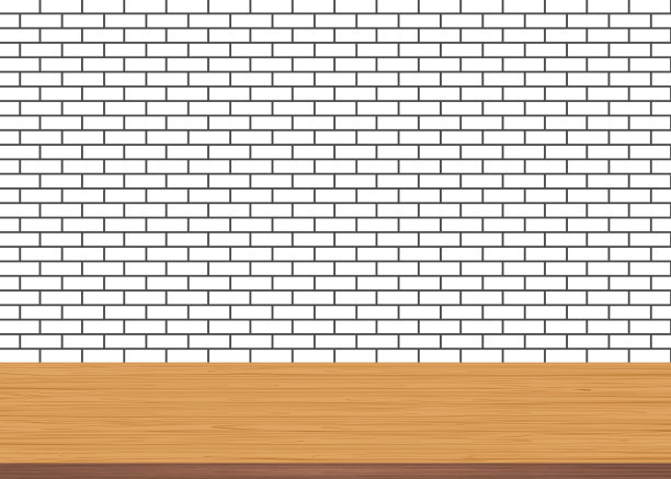 空木桌顶在砖白墙的背景上图片下载