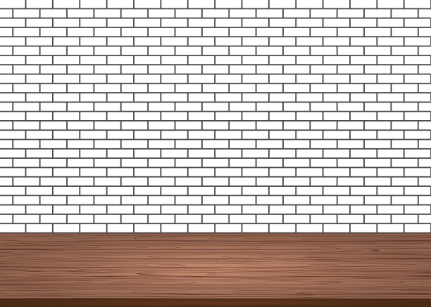 空木桌顶在砖白墙的背景上图片下载